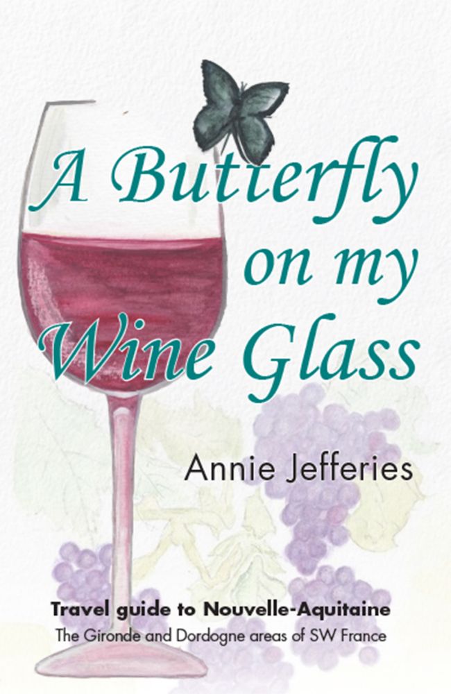 A butterfly on my wine glass